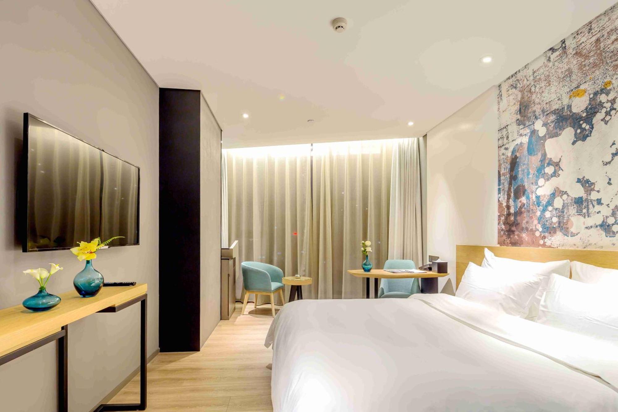 M Hotel ז'נגז'ו מראה חיצוני תמונה