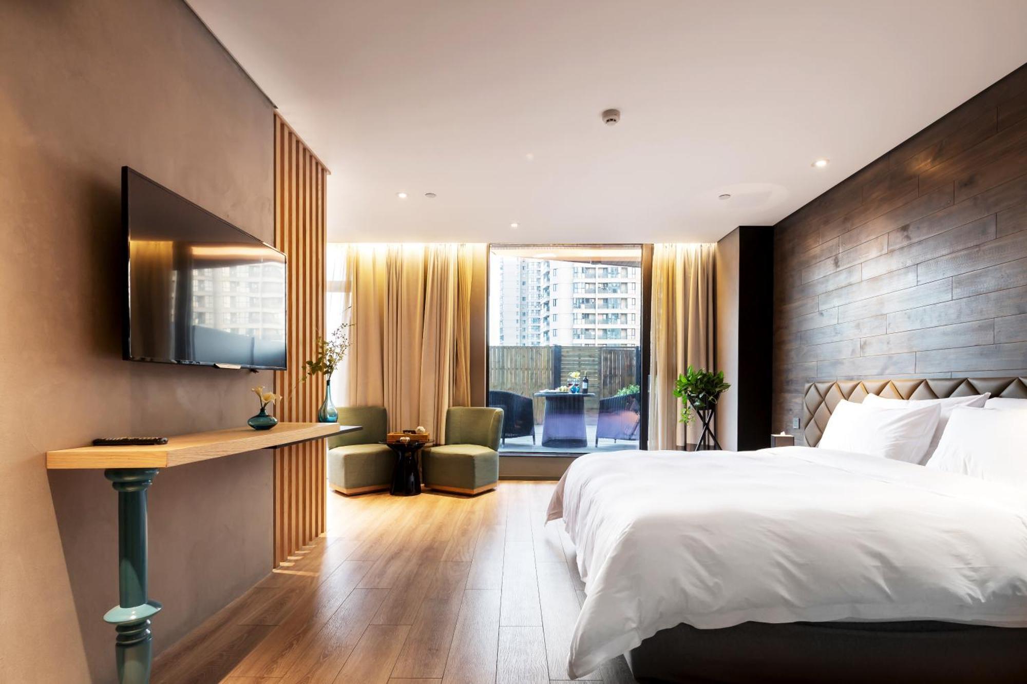M Hotel ז'נגז'ו מראה חיצוני תמונה