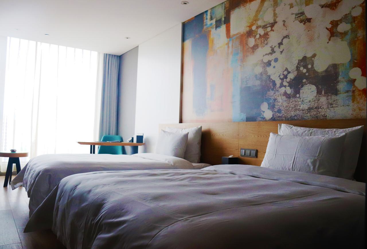 M Hotel ז'נגז'ו מראה חיצוני תמונה