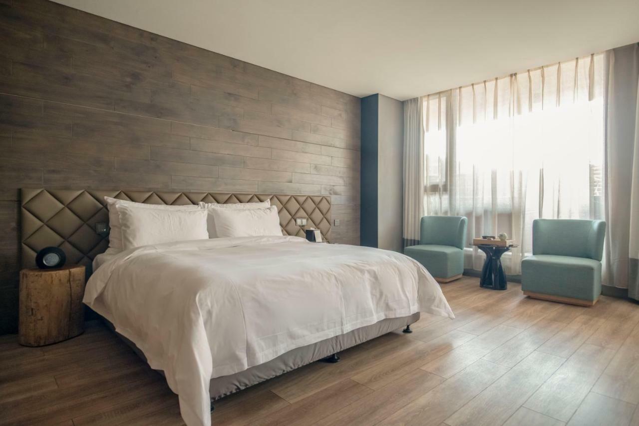 M Hotel ז'נגז'ו מראה חיצוני תמונה