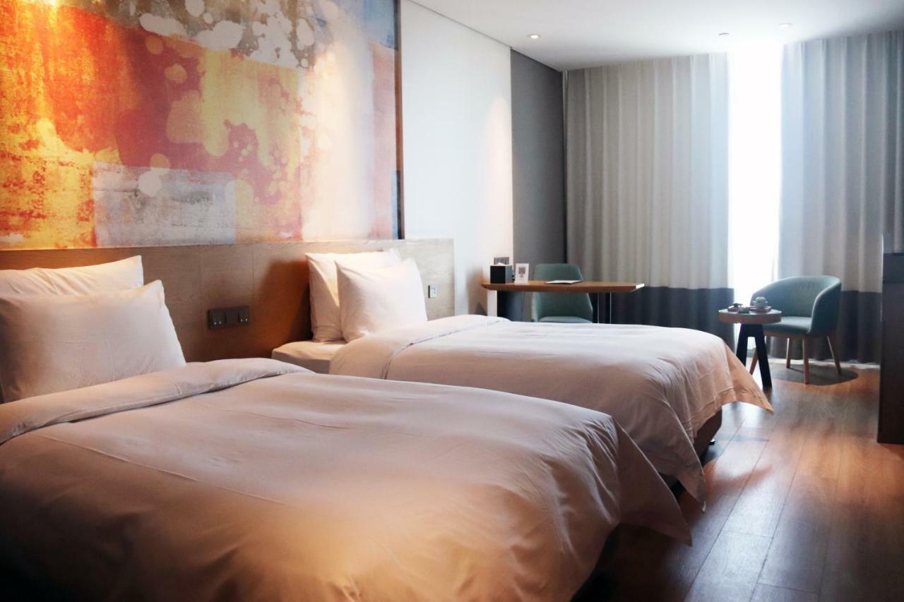 M Hotel ז'נגז'ו מראה חיצוני תמונה